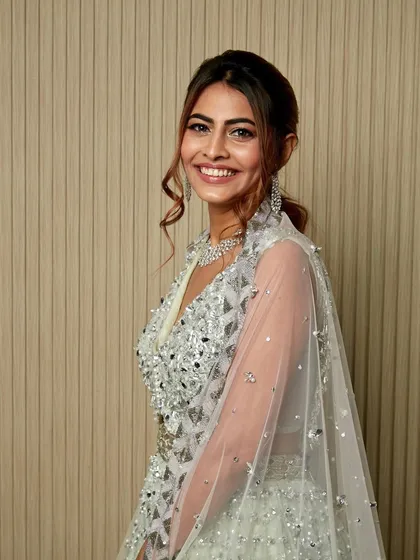 The happiness says it all. This glamorous, shimmering look was so much fun to create for her special night.