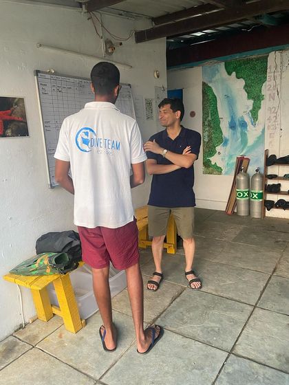 Moments from our Andaman dive trips, showing everything from gearing up at the dive center to relaxing on the boat between dives.