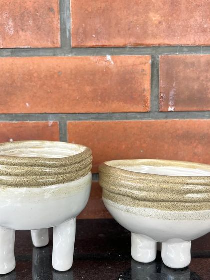A pair of charming three-legged bowls, perfect for serving dips or holding small trinkets. These were made by a student in one of my courses.