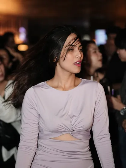 A candid shot of a guest in the middle of the dance floor.