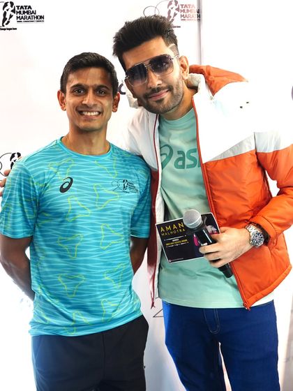 With squash champion Saurav Ghosal at the Tata Mumbai Marathon merchandise launch. It's always inspiring to interact with athletes who represent India on a global stage.