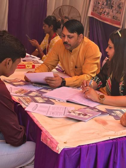 Assisting a young man with his legal queries at the DLSA camp. Our services cover a wide range of issues, including family law, property disputes, and senior citizen rights.