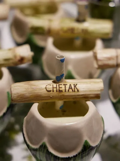 Paradise in a coconut shell. We serve refreshing coconut water with a custom-branded sugarcane stick, offering a natural and stylish beverage option.