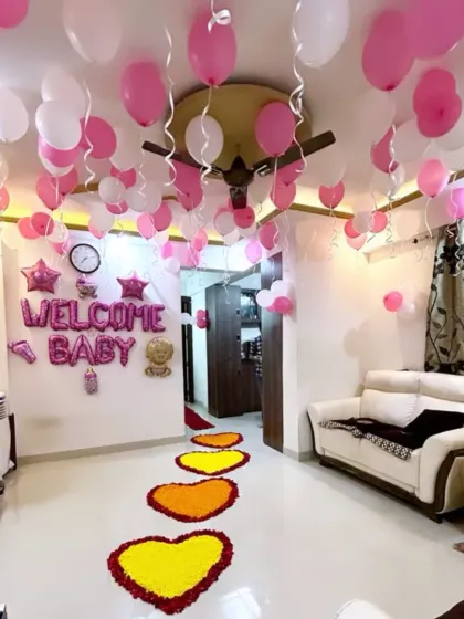 Bringing your baby home is a precious moment. I can fill your home with joy, using ceiling balloons, 'Welcome Baby' foil letters, and a beautiful pathway of flower petals to make it unforgettable.