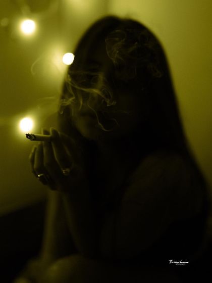 A very artistic and moody shot, using silhouette and smoke to create a mysterious and abstract portrait. This is for clients looking for something truly conceptual.