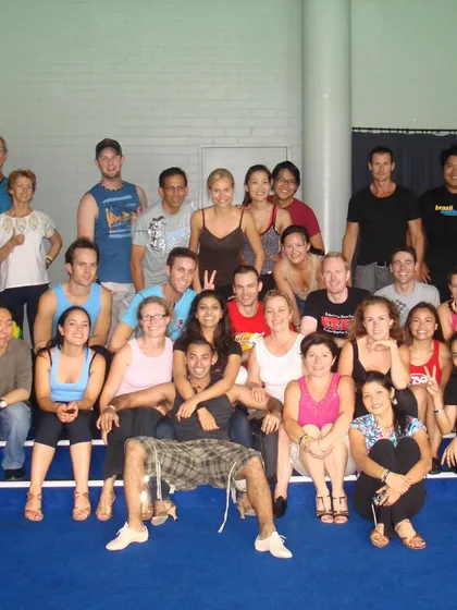 A group photo from one of our early international workshops. This shows the beginning of our journey of sharing our passion for dance with a global audience.