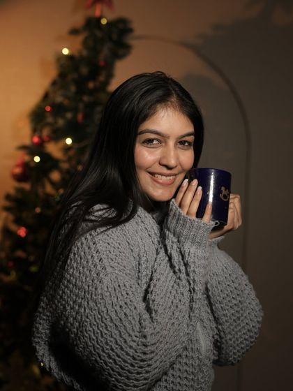My Christmas look, featuring a cozy grey knit sweater. Perfect for sipping hot chocolate by the tree.
