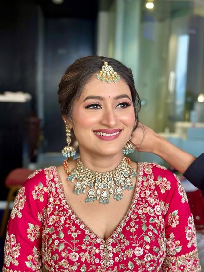 Elegant Bridal Buns & Updos photo 38