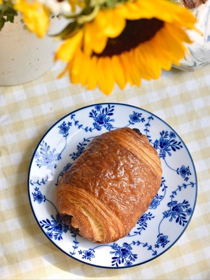 A simple, elegant Pain au Chocolat on a beautiful plate. Sometimes, the classics are all you need.