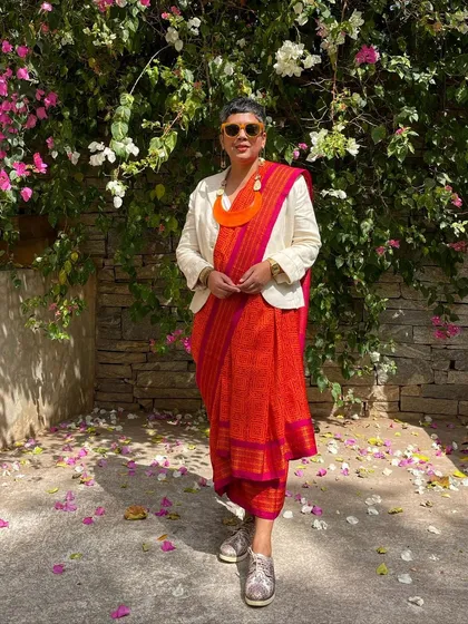 We believe in giving beautiful textiles a second life. This image showcases our overprinting service, where we take a pre-loved vintage Kanjeevaram silk saree from our founder's personal collection and refresh it with a vintage 'chunadi' block print.