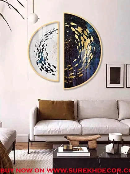 A modern and artistic diptych, this set of two semi-circular crystal paintings depicts schools of fish. The contrasting black and white backgrounds with golden accents create a balanced and visually striking composition.