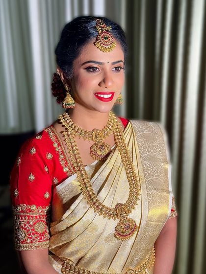 Anusha's radiant smile says it all. I worked with her through video consultations to create her dream look, and she looked absolutely stunning.