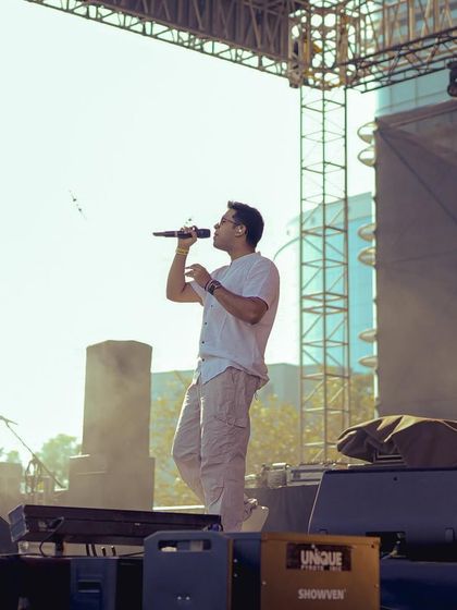 Singing my heart out under the sun at Zomaland. Outdoor festival gigs are a blast, and we know how to get a daytime crowd going with a powerful vocal performance.