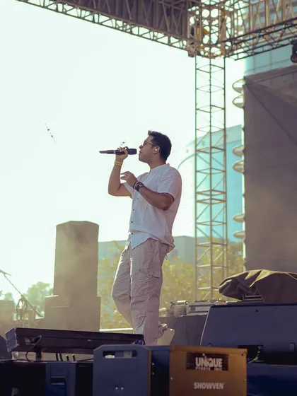 Singing my heart out under the sun at Zomaland. Outdoor festival gigs are a blast, and we know how to get a daytime crowd going with a powerful vocal performance.