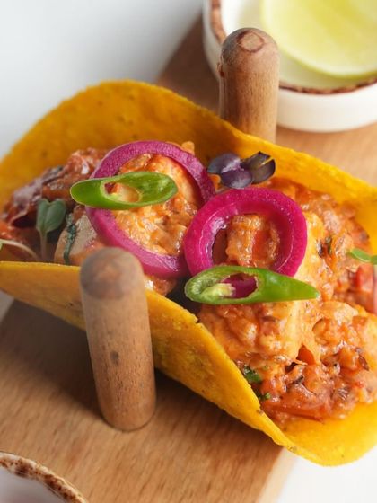 A detailed shot of the Shahi Paneer Roghni Taco, a highlight from our exclusive "Zaika-e-Rooh" menu.