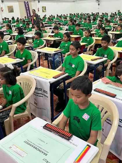 Our students thrive in a focused and competitive environment. This image captures the intense concentration during the Brainobrainfest, a large-scale abacus competition where our children get to test their skills against thousands of peers.