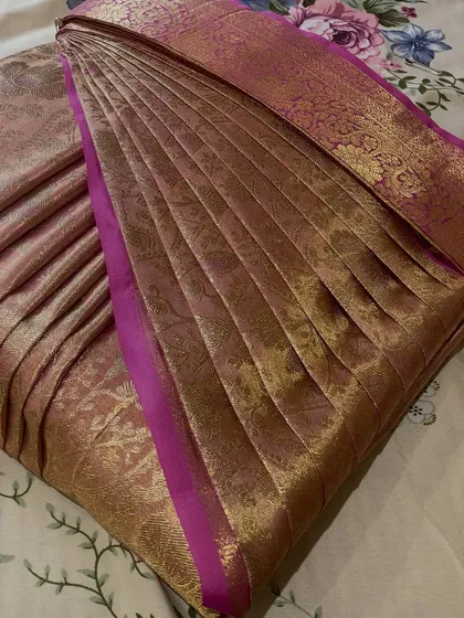 My pre-pleating and box-folding service is a lifesaver for destination weddings or early morning functions. I steam iron each pleat for a crisp, lasting finish, so your saree is ready to wear and completely stress-free.