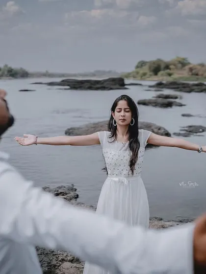A duplicate of image 110, this creative and cinematic pose is a fun way to add some drama and personality to your pre-wedding photos.