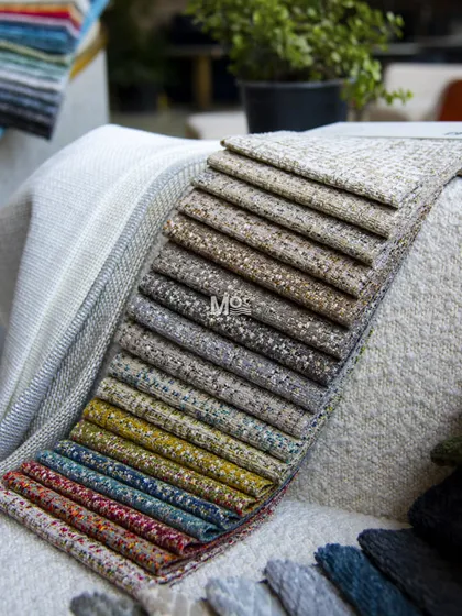 Every great design begins with a conversation, captured in a moodboard. This is where we align on your vision, layering textures and colors to set the tone. This selection of premium fabrics shows the foundation of a personalized and seamless design process.