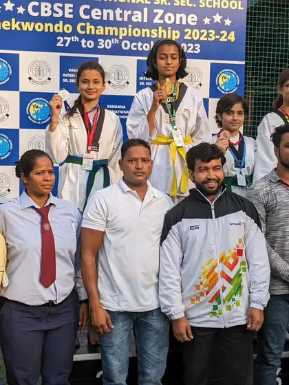 My female students celebrating their wins at the CBSE Taekwondo Championship 2023.