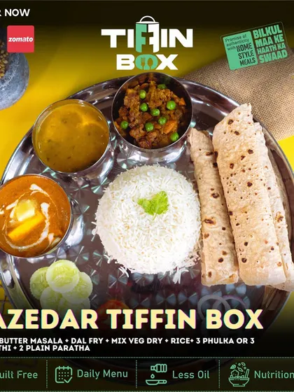Our Mazedar Tiffin Box truly lives up to its name. It features Paneer Butter Masala, Dal Fry, Mix Veg Dry, rice, and a choice of phulka, chapati, or paratha.