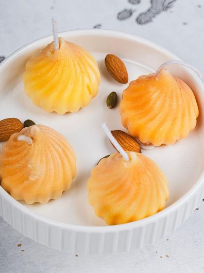 My modak candles are a tribute to festive traditions. I craft them to look just like the sweet dumplings offered during Ganesh Chaturthi, making them a perfect addition to your festive decor or as a thoughtful, unique gift.