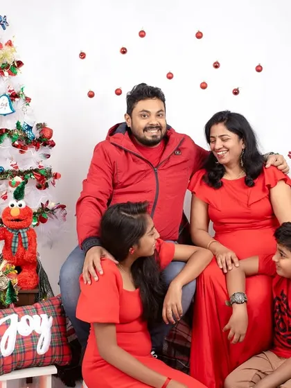 I offer themed sessions to make your family portraits extra special. This Christmas-themed shoot was filled with festive cheer, coordinated red outfits, and lots of smiles.