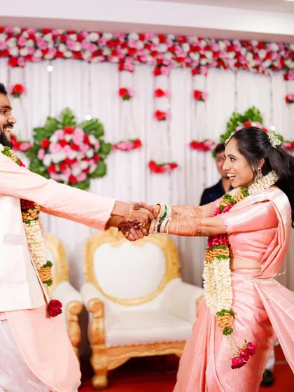 Twirling into their future together. This look, featuring a traditional pink Kanjeevaram saree, was completed with expert draping and hairstyling by my team.