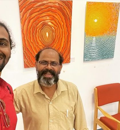 With one of the esteemed guests at the conference.