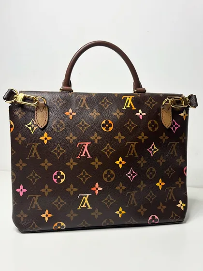 The other side of the custom LV bag, where I painted some of the monograms in a beautiful gradient of colors.