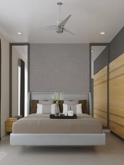 This render showcases a minimalist bedroom with a floating bed, textured accent wall, and warm wood wardrobes with intricate detailing.