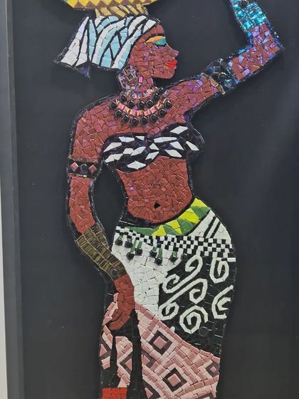 A mosaic artwork from Egyptian artist Nagla, showcasing her incredible skill in creating detailed figures and scenes. Her work brings together influences from the Middle East and beyond.