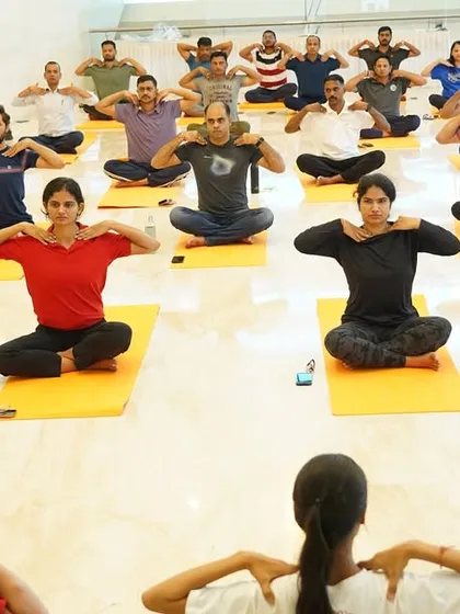 An instructor from my team leading a session for ONGC employees. We ensure that every participant receives personal attention and guidance to perform the practices correctly and safely.
