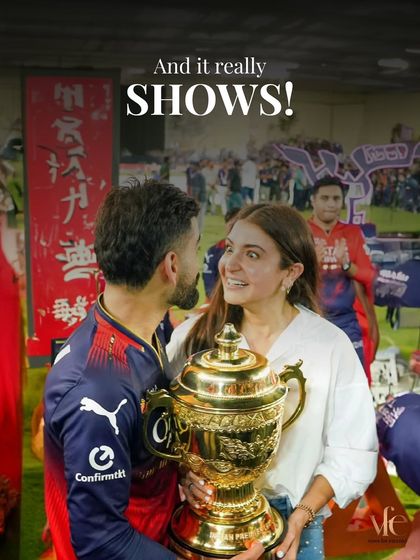 The look between Virat and Anushka with the IPL trophy says it all. It's a victory for their team, but also a victory for their partnership.