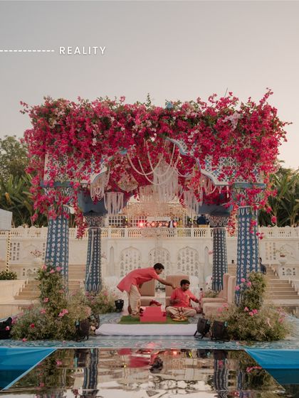 Reality: The vision brought to life. The bougainvillea cascades over the hand-painted pillars, the water reflects the sky, and the mandap stands as a testament to our meticulous planning. This is the magic of turning a render into reality.