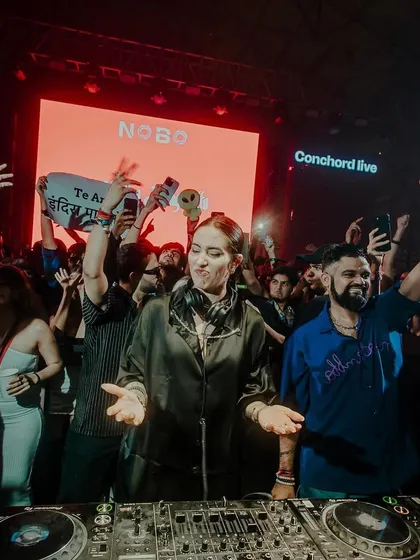 On the decks with Indira Paganotto, surrounded by an adoring crowd. Hosting her India tour was a massive project and an incredible experience.