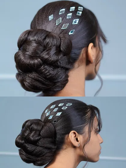 I love adding modern touches to classic styles. This sleek pulling bun is accented with small, diamond-shaped mirror pieces for a chic and contemporary finish that catches the light beautifully.