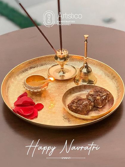 Welcoming the divine blessings of Navratri with my handcrafted brass pooja thali, complete with a diya, bell, and incense holder.