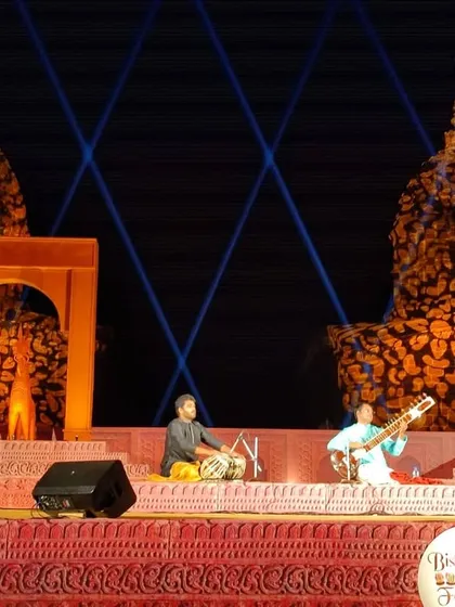 A wide shot of the performance at the Bishnupur Music Festival. The scale of the event, organized by the West Bengal government, was truly impressive.