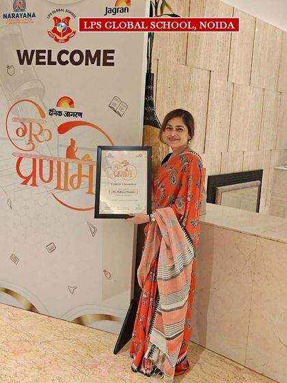 Ms. Mahuya Mandal proudly holds her Certificate of Recognition. Her leadership drives our school's commitment to innovation and academic excellence.