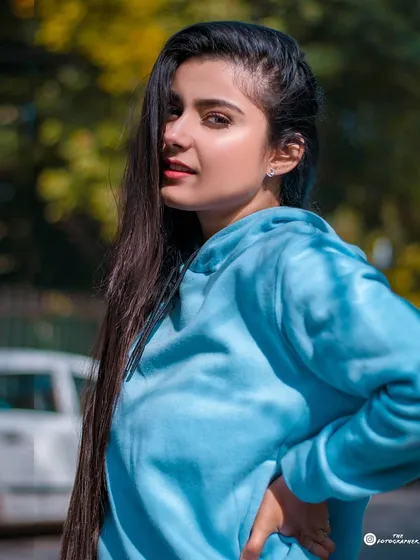 A relaxed, casual portrait from an outdoor session. My goal is to make you feel comfortable, capturing natural expressions and creating photos that truly reflect your personality.