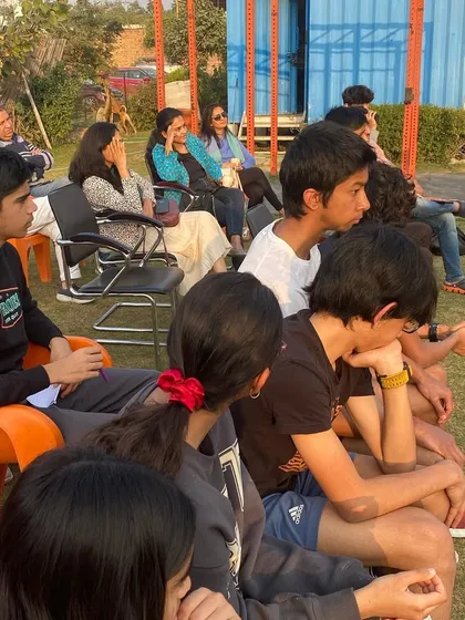 A close up of the athletes and parents listening during the nutrition talk. An engaged audience eager to learn.