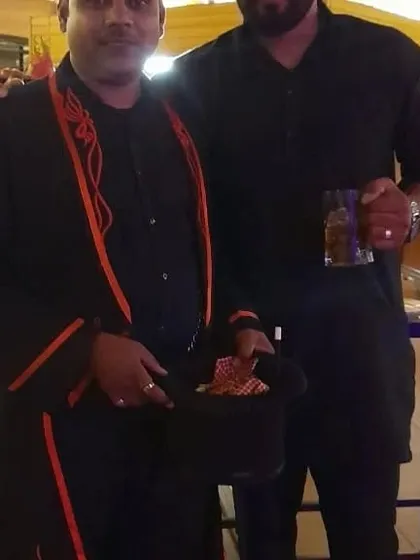 Sharing a moment with a happy guest after a performance. It’s always a pleasure to pose for a photo and chat about the magic after the show is over.