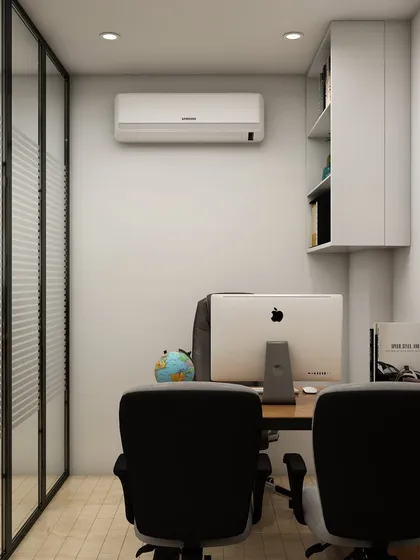 A view of the office cabin focusing on the frosted glass partition, which provides privacy while allowing light to filter through. This is a smart solution for creating separate spaces within an open-plan office.
