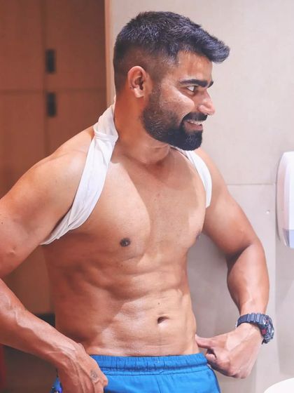 A client's defined abs are built through determination, self-control, and discipline. I provide the roadmap, but it's their hard work that earns results like this.