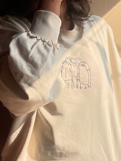 A closer look at the delicate thread work on this custom line art piece. I love the way the sunlight catches the stitches.