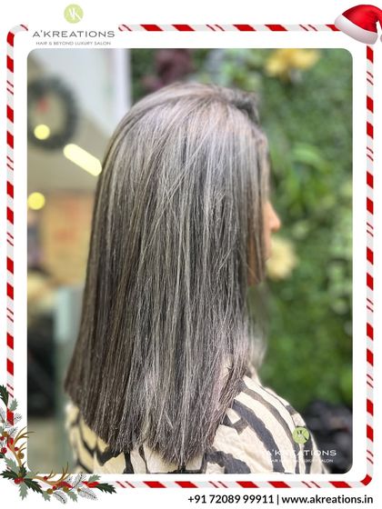 A sleek and modern take on highlights. The straight styling showcases the precise placement of these cool-toned streaks for a chic, polished finish.