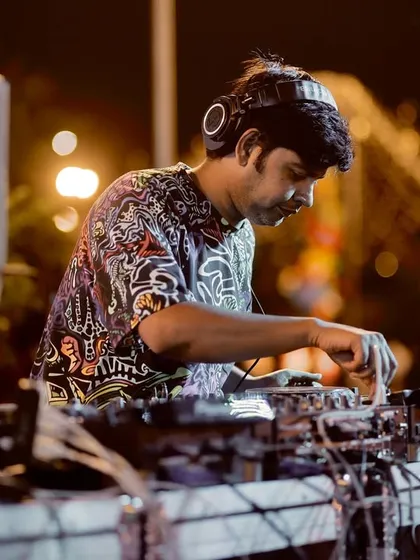 In the zone. This is me in my element, focused on reading the crowd and selecting the next track to keep the energy flowing. Every event is a unique journey, and I'm there to guide the sound.
