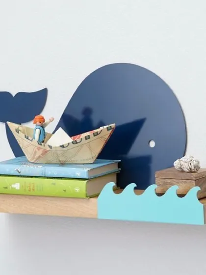 This whale-themed wall shelf is a great way to add a touch of ocean adventure to a nursery or playroom. I crafted it from solid wood with a smooth finish, making it a durable and whimsical spot for displaying small toys, books, or keepsakes.