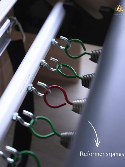 The reformer springs are the heart of the machine. Their different tensions allow me to customize the resistance for each client and every exercise, ensuring a perfectly tailored workout.